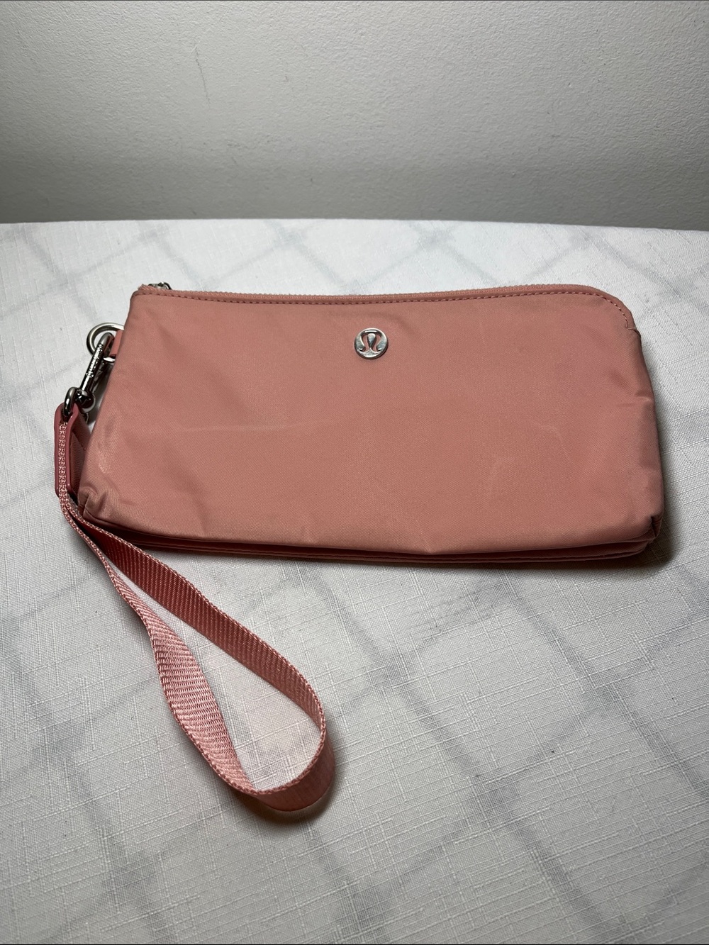Lululemon Coral Pink Wristlet Pouch
Two zipper pockets